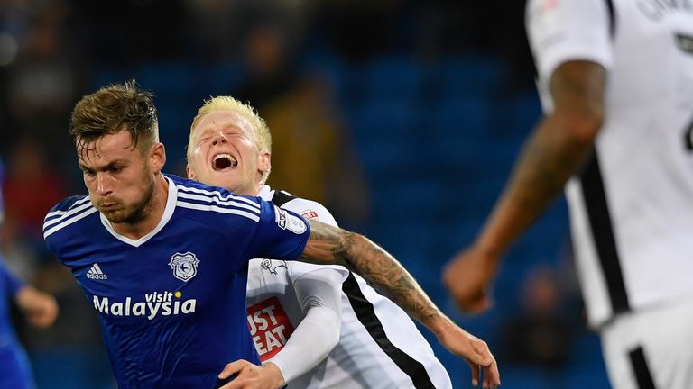 Derby's Will Hughes (r) attempts to challenge Joe Ralls of Cardiff