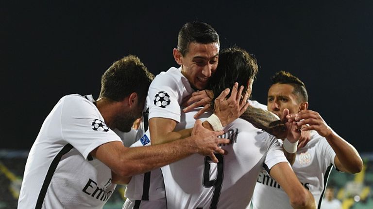 Paris Saint-Germain's Uruguayan forward Edinson Cavani (C) celebrates with teammates after scoring against Ludogorets Razgrad.