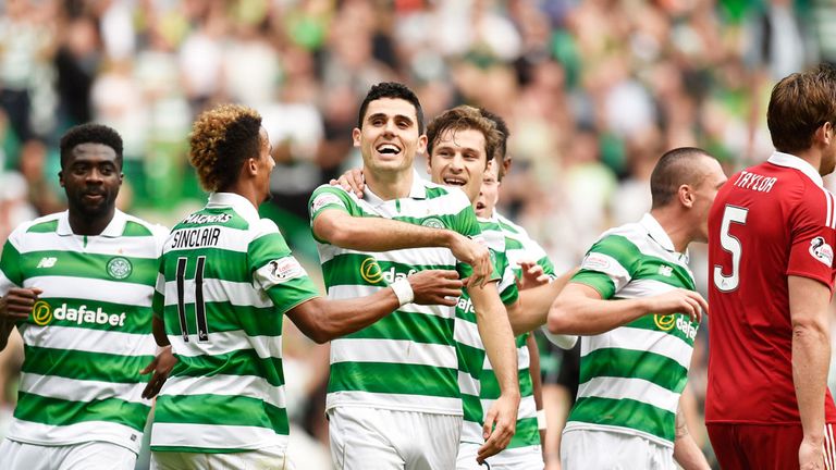 Celtic celebrate after Tom Rogic (centre) scored the fourth goal against Aberdeen