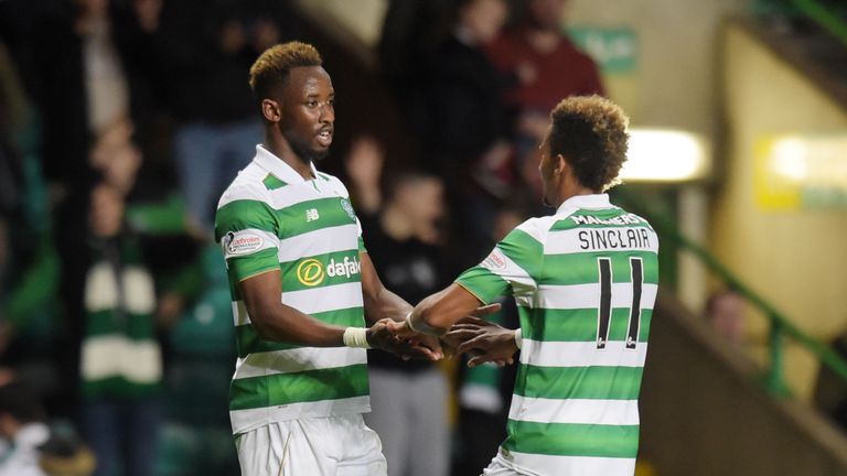 Celtic's Moussa Dembele (left) celebrates his side's second with Scott Sinclair