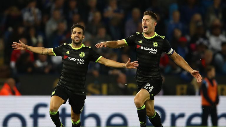 Cesc Fabregas of Chelsea celebrates scoring his side's fourth goal with Gary Cahill