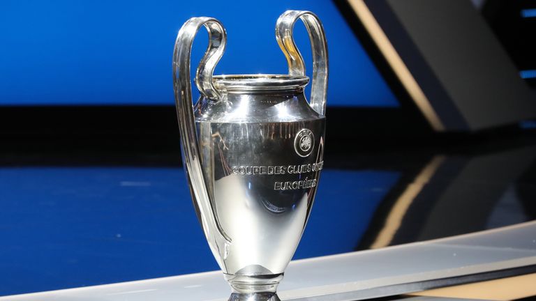 The Champions League trophy is pictured at the start of the UEFA Champions League Group stage draw ceremony, on August 25, 2016 in Monaco.  AFP PHOTO / VAL
