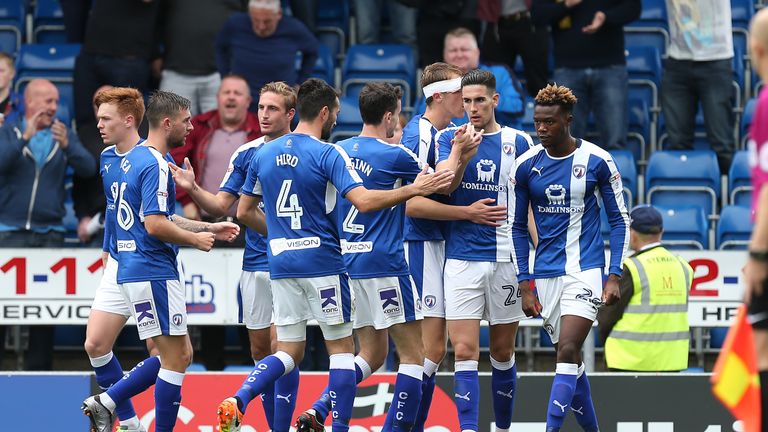 CHESTERFIELD, ENGLAND - SEPTEMBER 17: Connor Wilkinson of Chesterfield (2nd right) is congratulated by team mates after scoring his and his sides second go