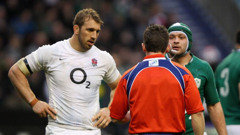 Referee Nigel Owens talks to Chris Robshaw of England and Rory Best of Ireland after biting allegations