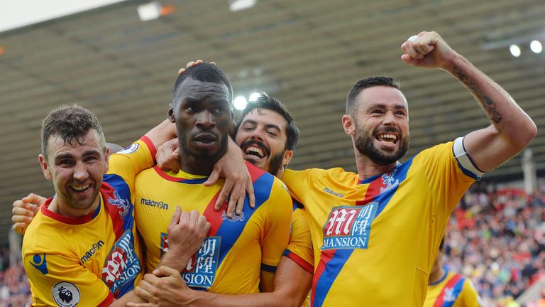 SUNDERLAND, ENGLAND - SEPTEMBER 24:  Christian Benteke of Crystal Palace celebrates scoring his sides third goal with his team mates during the Premier Lea