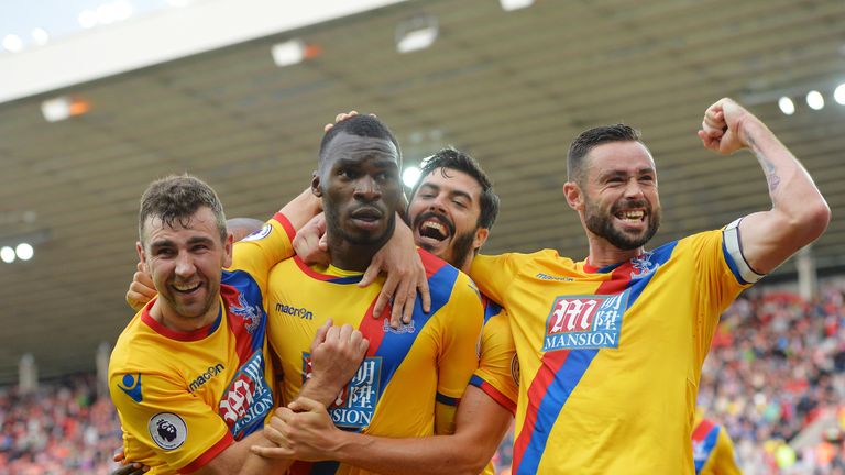 SUNDERLAND, ENGLAND - SEPTEMBER 24: Christian Benteke of Crystal Palace celebrates scoring his sides third goal with his team mates during the Premier Leag