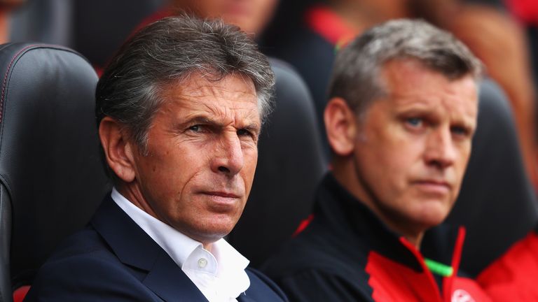 Claude Puel, manager of Southampton and Southampton coach Eric Black (R) 