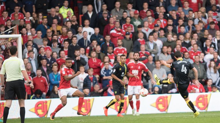 Graham Dorrans scores the second goal for Norwich during the Sky Bet Championship match against Nottingham Forest