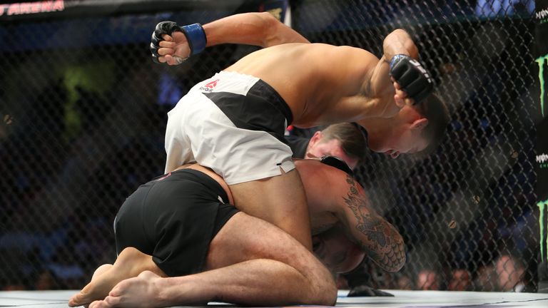 CLEVELAND, OH - SEPTEMBER 10: Mickey Gall punches CM Punk during the UFC 203 event at Quicken Loans Arena on September 10, 2016 in Cleveland, Ohio. (Photo 