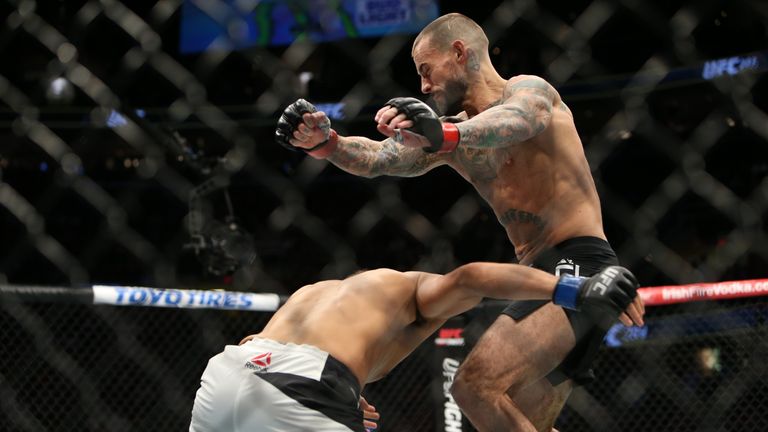 CLEVELAND, OH - SEPTEMBER 10: Mickey Gall looks to take down CM Punk during the UFC 203 event at Quicken Loans Arena on September 10, 2016 in Cleveland, Oh