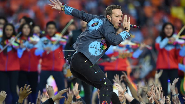 Chris Martin of Coldplay performs at the half-time show of Super Bowl 50