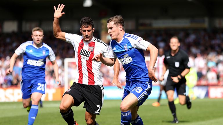 Ipswich Town's Conor Grant and Brentford's Maxime Bentley battle for the ball