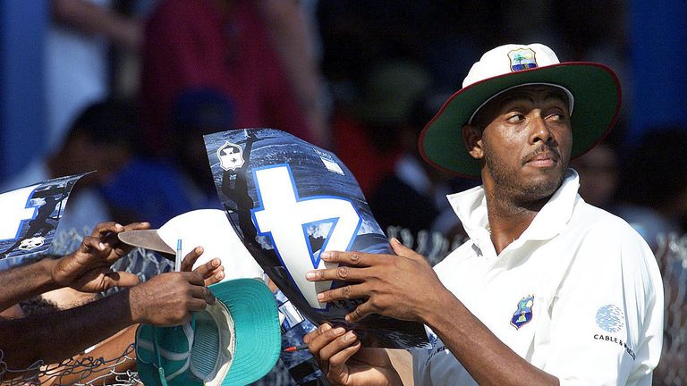 19 Mar 2001:  Courtney Walsh of the West Indies signing autographs after claiming his record 500th Test Wicket after trapping Jacques Kallis lbw for a duck