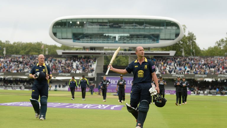 Jonathan Trott and Tim Ambrose of Warwickshire leave the field after winning the Royal London One-day Cup final 