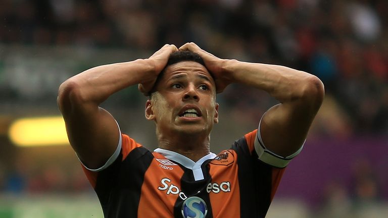 SWANSEA, WALES - AUGUST 20:  Curtis Davies of Hull reacts during the Premier League match between Swansea City and Hull City at Liberty Stadium on August 2