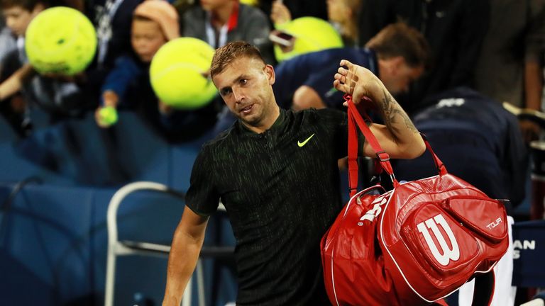 Dan Evans left the court to a standing ovation after his defeat