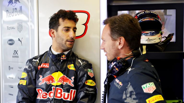BUDAPEST, HUNGARY - JULY 22:  Red Bull Racing Team Principal Christian Horner and Daniel Ricciardo of Australia and Red Bull Racing talk in the garage duri