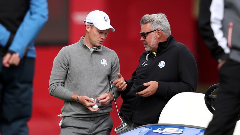 Europe's Danny Willett (left) chats with captain Darren Clarke (right) during a practice session ahead of the 41st Ryder Cup at Hazeltine