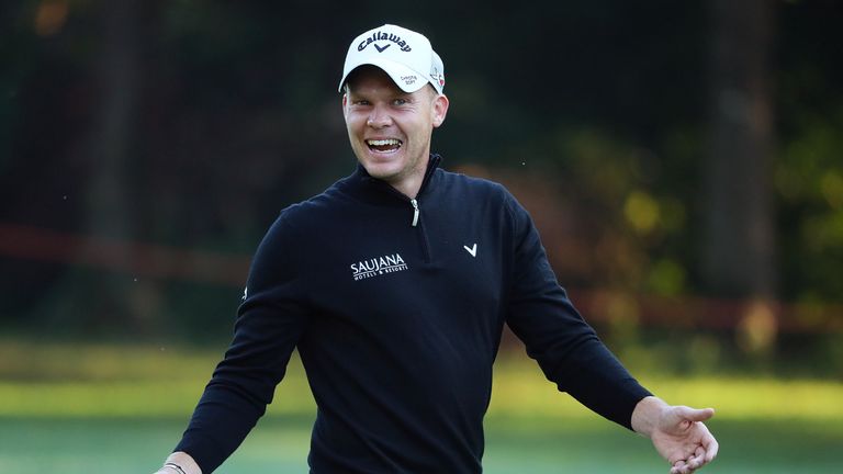 Danny Willett of England gestures on the 8th hole during the second round of the Italian Open 