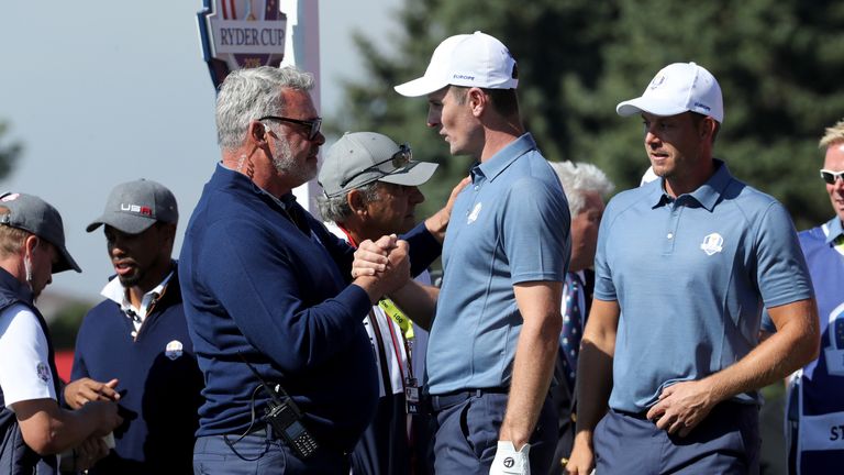 Captain Darren Clarke speaks to Justin Rose during afternoon fourball matches