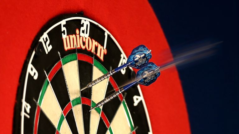 LONDON, ENGLAND - DECEMBER 27:  A detailed view of darts in the dartboard during Day Seven of the William Hill PDC World Darts Championships at Alexandra P