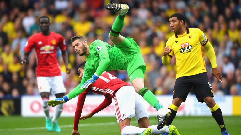 David de Gea falls over teammate Chris Smalling during Manchester United's Premier League match with Watford.