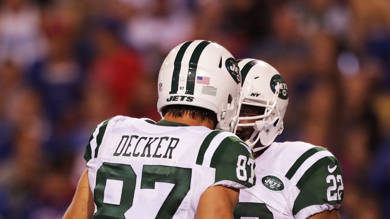ORCHARD PARK, NY - SEPTEMBER 15:   Eric Decker #87 of the New York Jets celebrates a touchdown by  Matt Forte #22 of the New York Jets against the Buffalo 