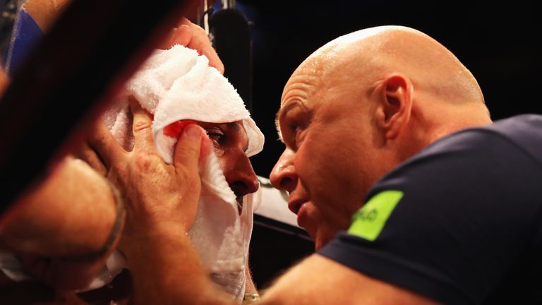 LONDON, ENGLAND - SEPTEMBER 10:  Kell Brook with trainer Dominic Ingle in his corner during the World Middleweight Title contest against Gennady Golovkin a