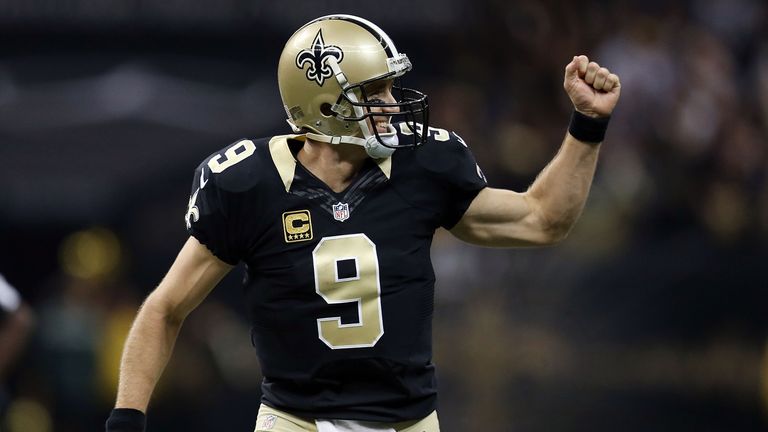 NEW ORLEANS, LA - NOVEMBER 01:  Drew Brees #9 of the New Orleans Saints celebrates a touchdown during the second quarter of a game against the New York Gia