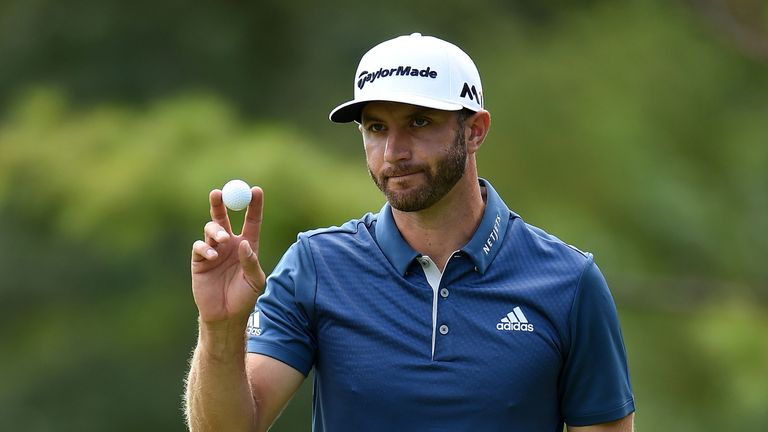 CARMEL, IN - SEPTEMBER 11:  Dustin Johnson waves to the crowd following a birdie on the first hole during the final round of the BMW Championship at Crooke