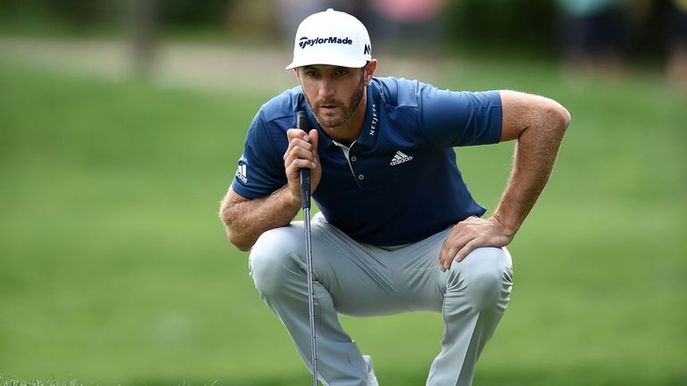 CARMEL, IN - SEPTEMBER 11:  Dustin Johnson lines up a putt on the first hole during the final round of the BMW Championship at Crooked Stick Golf Club on S