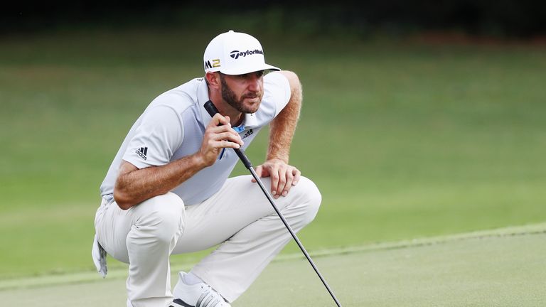 ATLANTA, GA - SEPTEMBER 22:  Dustin Johnson lines up a putt on the seventh green during the first round of the TOUR Championship By Coca-Cola at East Lake 