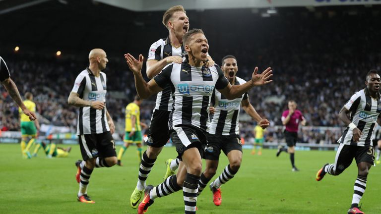 Newcastle's Dwight Gayle (centre) celebrates after scoring the late winner