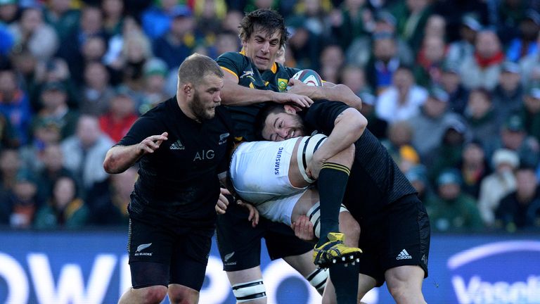 Eben Etzebeth of South Africa gets tackled during The Castle Lager Rugby Championship 2015 match between South Africa and New Zealand