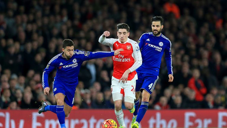 Chelsea's Eden Hazard (left) and Cesc Fabregas (right) battle for the ball with Arsenal's Hector Bellerin 