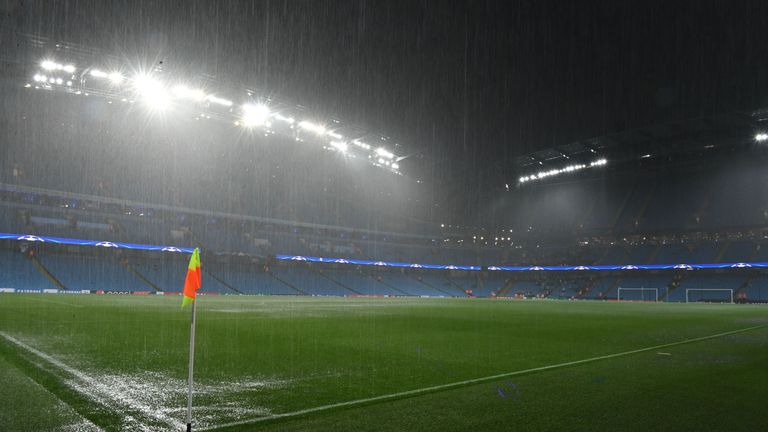 Heavy rain pummels the pitch ahead of the UEFA Champions League group C football match between Manchester City and Borussia Monchengladbach at the Etihad s
