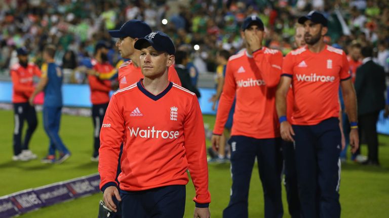 MANCHESTER, ENGLAND - SEPTEMBER 07:  Eoin Morgan the captain of England leads his team off after defeat to Pakistan in the NatWest International T20 match 