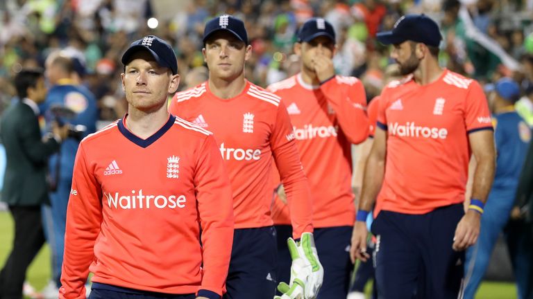 England's Eoin Morgan leads his players off the pitch after losing against Pakistan