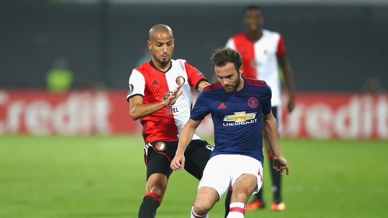 Juan Mata holds off Karim El Ahmadi