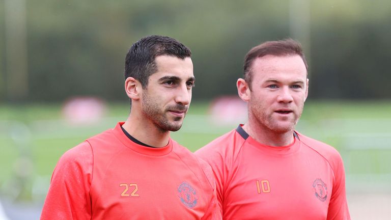 Henrikh Mkhitaryan and Wayne Rooney in training