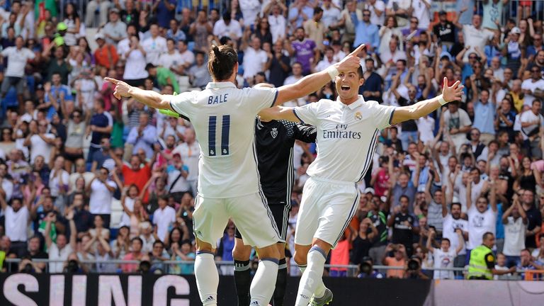 Cristiano Ronaldo celebrates with Gareth Bale after scoring Real Madrid's first goal.
