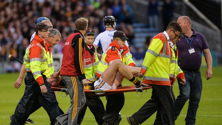 Michael Fennelly leaves the field on a stretcher against Waterford after picking up an Achilles injury