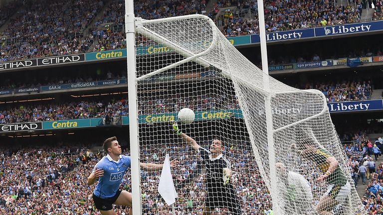 Dublin's Stephen Cluxton (right) and David Byrne fail in to prevent Kerry's second goal by Paul Geaney