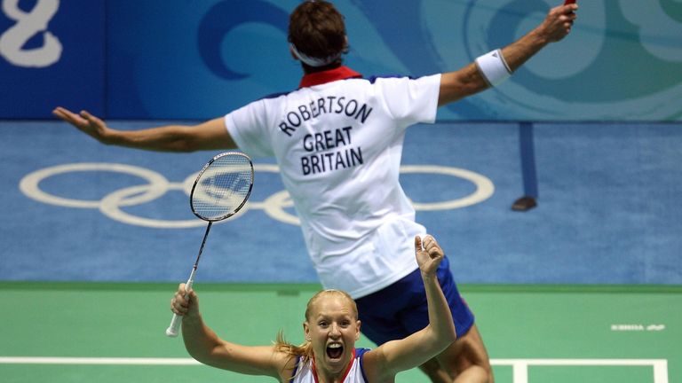 Gail Emms and Nathan Robertson of Great Britain celebrate after defeating Zheng Do and Gao Ling of China in the mixed doubles first round badminton match o