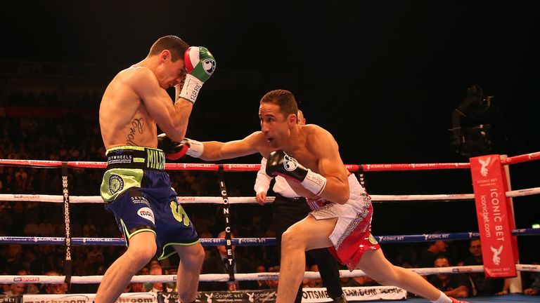 MANCHESTER, ENGLAND - SEPTEMBER 13: Gamaliel Diaz exchanges blows with Anthony Crolla (L) during the WBO Inter-Continental Lightweight title fight at the P