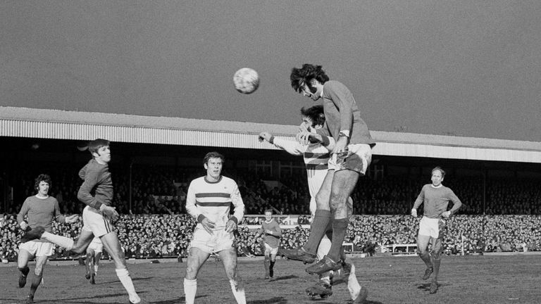 Manchester United's No 11 George Best leaps high above Northampton Town defenders to head in United's first goal from a cross by No 10 Brian Kidd