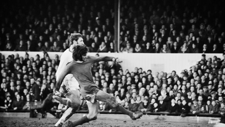 Manchester United player George Best scores during a match against Northampton Town, UK, 7th February 1970. 