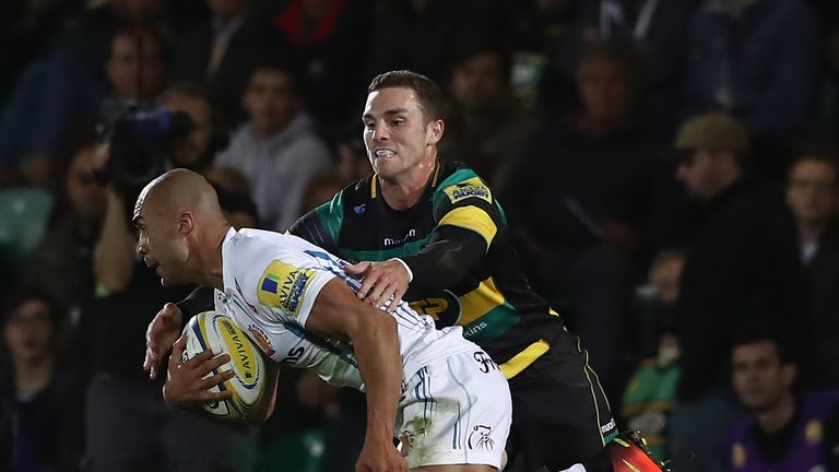Olly Woodburn is tackled by George North