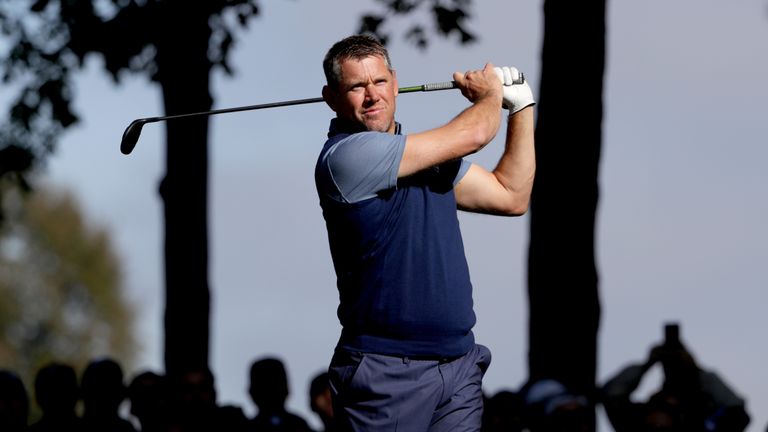 Lee Westwood of Europe plays a shot on the 13th hole during morning foursome matches of the 2016 Ryder Cup at Hazeltine