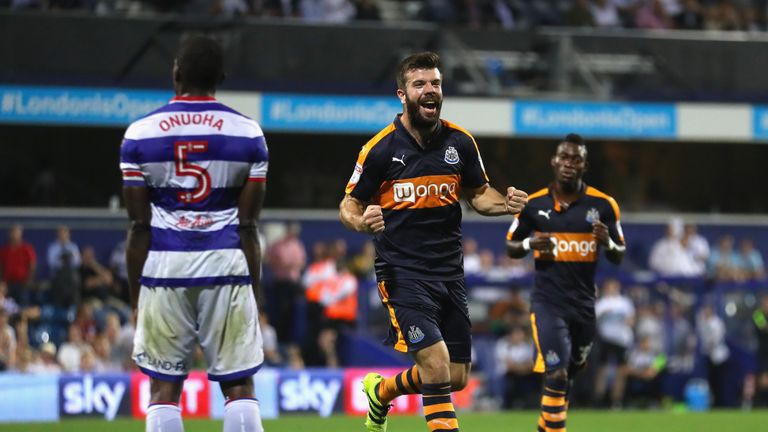 Grant Hanley of Newcastle celebrates after scoring against QPR